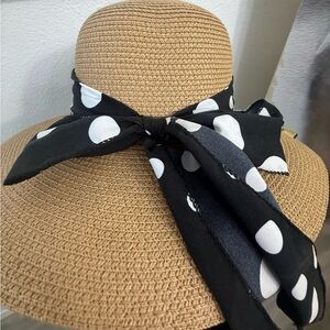 Elegant Tan Sun Hat with Black and White Polka Dot Bow
